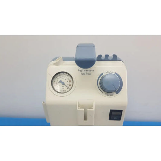 White and blue Medela Vario 18 suction pump aspirator with pressure gauge vacuum dial and control switch portable unit