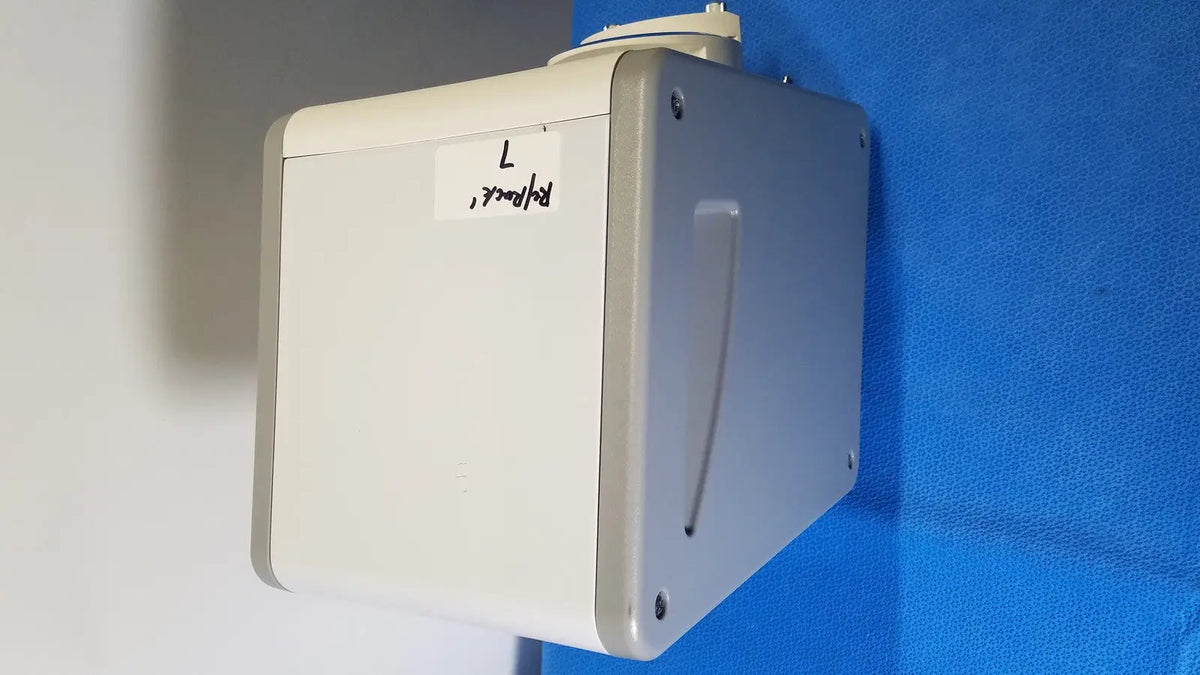 Beige and gray wall-mounted medical device with small side handle medivators sbp-100 scope buddy plus