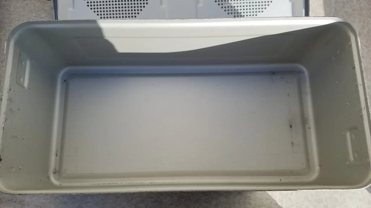 Gray plastic storage bin with a perforated lid used with medline aluminum storage and sterilization container
