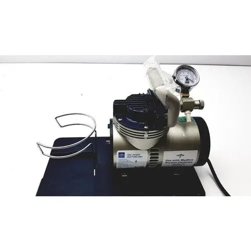 Silver and black MedLine HCS 7000 suction aspirator unit with pressure gauge and metal hose attachment for vacuum assist