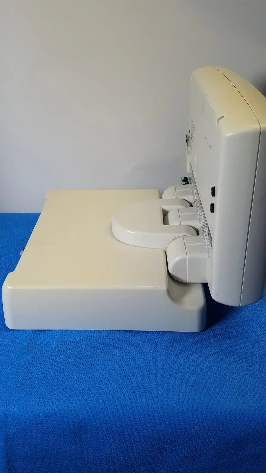 Cream-colored plastic baby monitor with sleek rounded edges from medrad spectris solaris ep mr contrast injector system