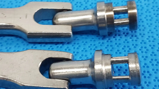Silver-colored metal universal joint connectors with polished finish for medtronic octobase retractor handle lot of 2