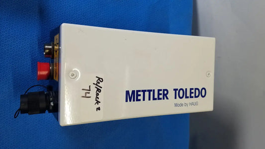 White rectangular mettler toledo haug industrial weighing scale with blue branding and red button for slc power supply use