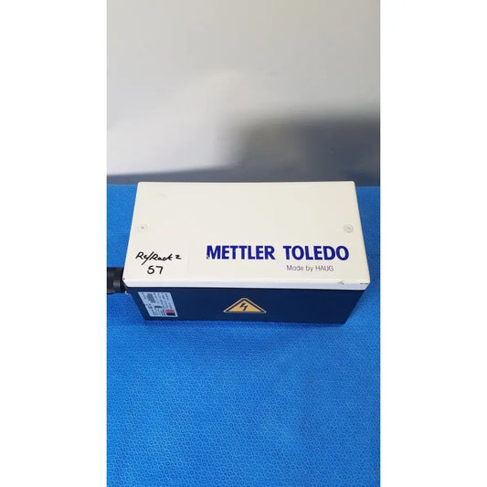White and blue rectangular electronic balance with mettler toledo branding in mettler toledo haug slc high voltage power supply