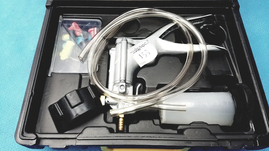 Silver and black air-powered suction tool with clear tubing branded tianheng in mityvac mv8500 elite automotive kit