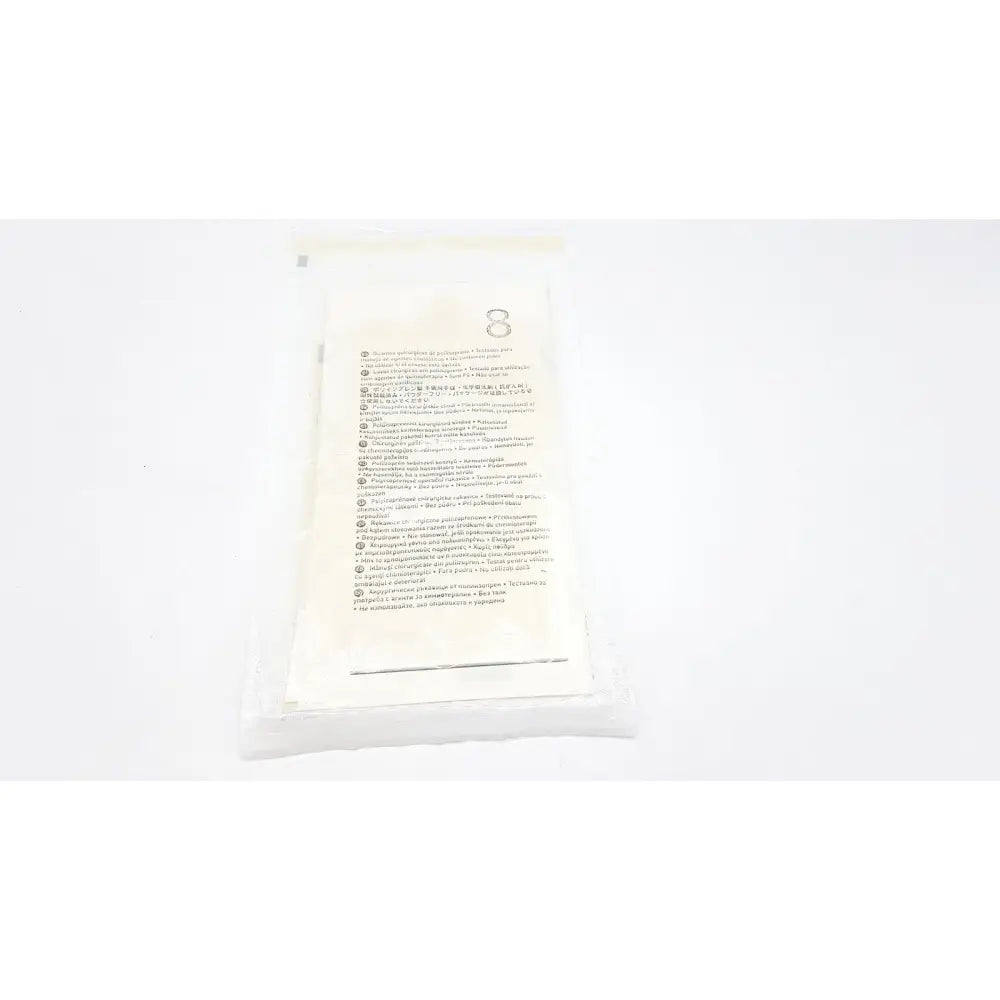 White plastic packet of molnlycke biogel pi ultratouch g size sterile gloves with printed multilangual text