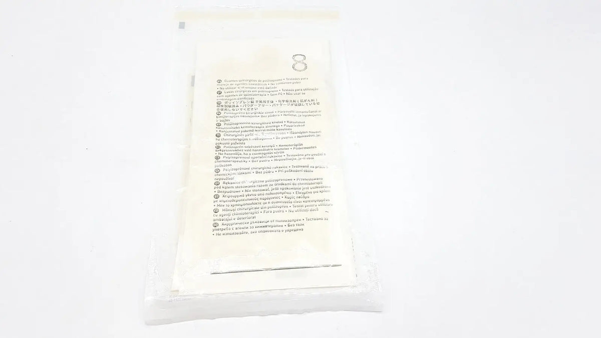 White plastic packet of molnlycke biogel pi ultratouch g size sterile gloves with printed multilangual text