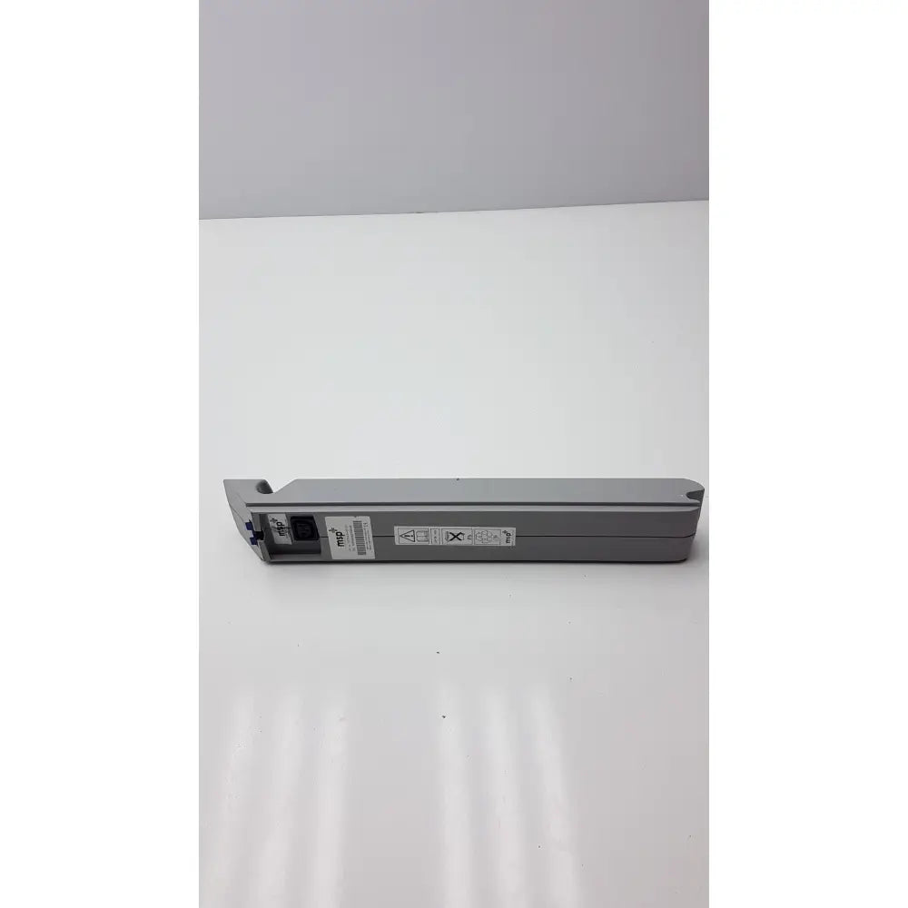 Gray plastic hp printer cartridge with visible labeling used as msp battery 24v dc 4ah for arjo devices
