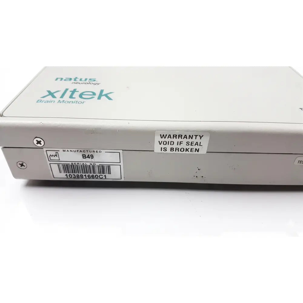White rectangular natus neurology xltek brain monitor with branding and warranty sticker on its side for neurological use