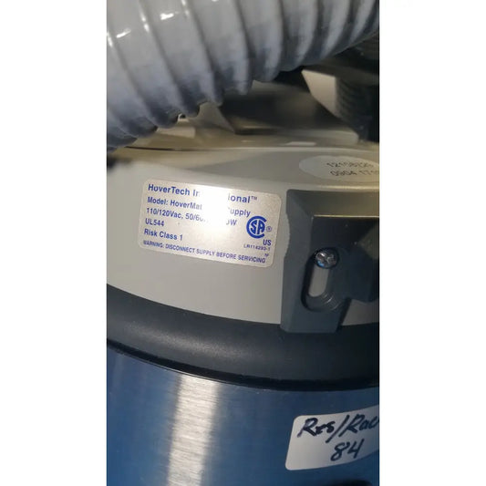 Gray and blue nilfisk hovermatt air supply unit industrial vacuum cleaner with hovertech international label visible