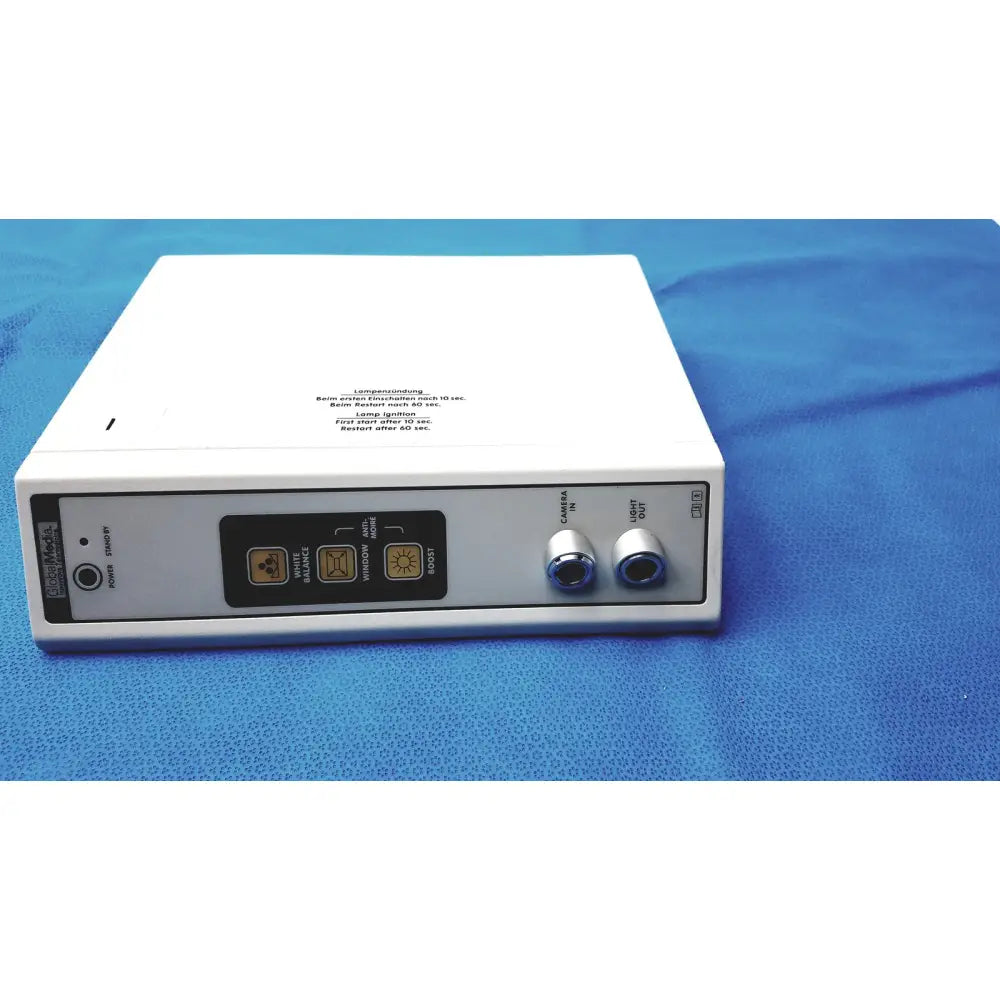 White rectangular ntsc otoscope camera with control panel, xenon light source, and silver camera and light ports