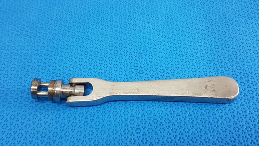 Silver-colored metal octobase retractor handle with mechanical joint for surgical retractor positioning component