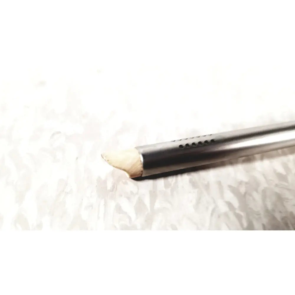 A sleek metallic olympus a2181 endoscope sheath with small ventilation holes and a worn wooden tip in 27fr size