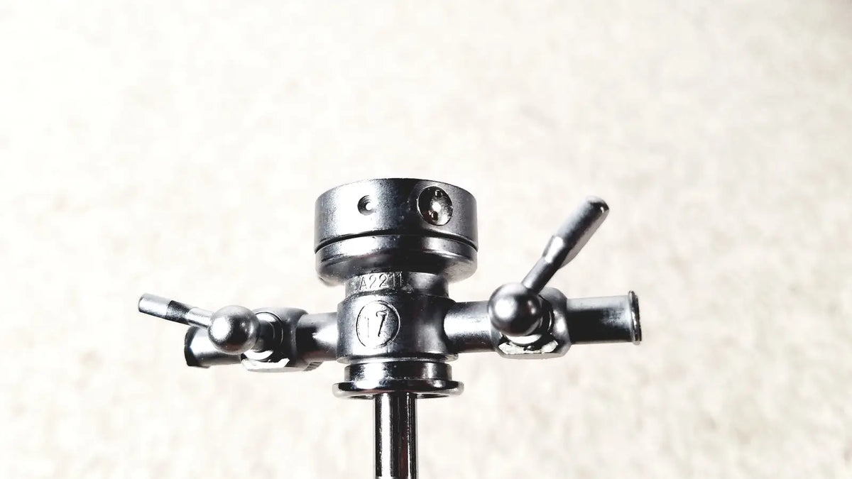 Black metal tripod head with three adjustable knobs and central mounting plate for olympus a2211 dual valve sheath use