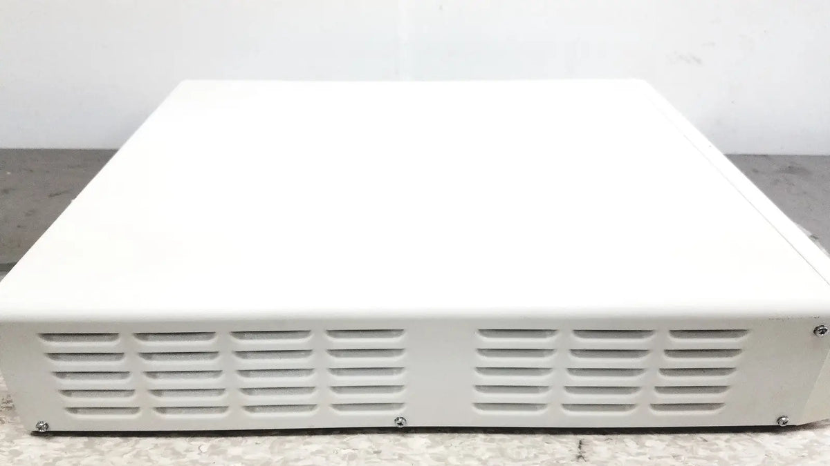 White rectangular olympus visera elite video system otv-s190 server rack with horizontal ventilation slats at bottom edge