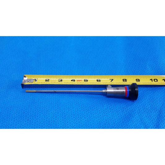 Silver and black olympus wa96201a autoclavable ent sinuscope endoscope with red and blue bands beside yellow measuring tape
