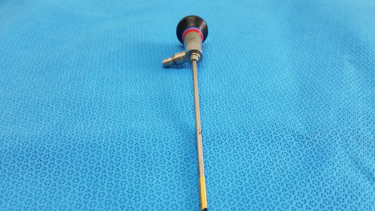 Silver autoclavable ent sinuscope endoscope wa96201a with black handle red accents and yellow-tipped shaft by Olympus