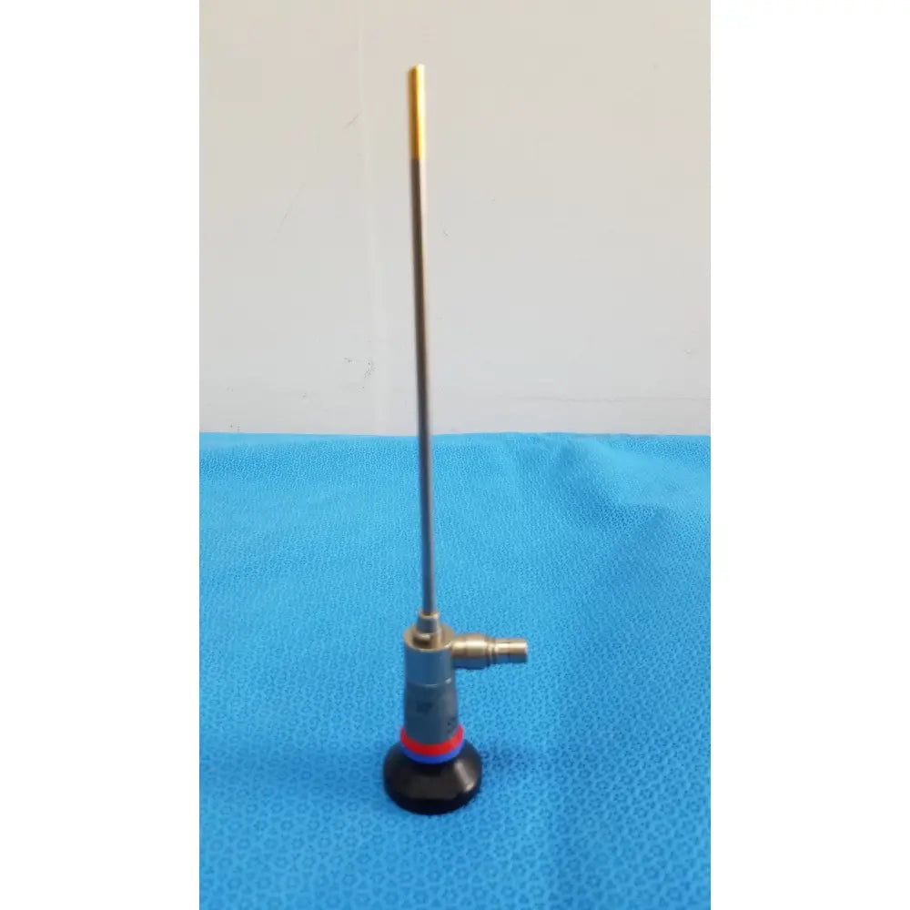 Slender metallic olympus wa96201a autoclavable ent sinuscope endoscope with gold-tipped probe and gray body with color bands