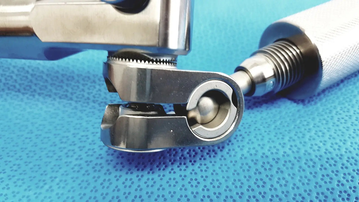 Stainless steel Omni-Tract 11184 speed-tract support arm with precision joint and threaded shaft for stable surgical retraction