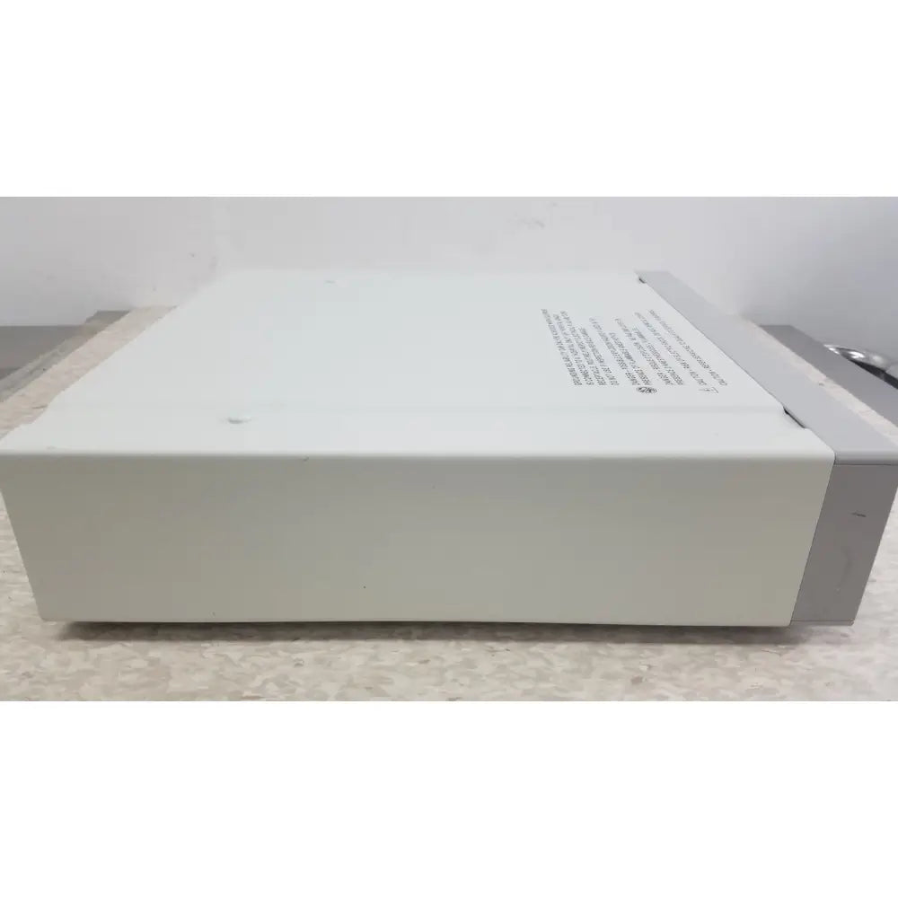 Off-white optronics microcast 3ccd electronic device with gray side panel and printed specifications on top surface