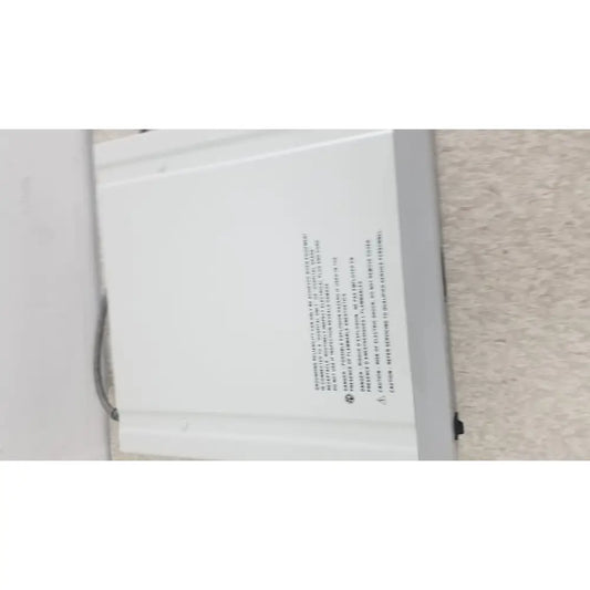 White rectangular laptop battery with safety warnings shown on the back side for optronics microcast 3ccd 1080p