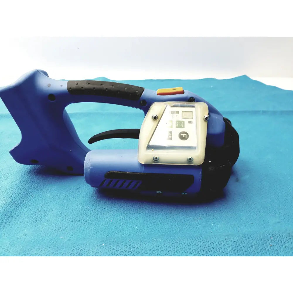 Blue plastic orgapack or-t 250 battery operated cordless strapping tool with black grip and beige control panel for reuse medical equipment