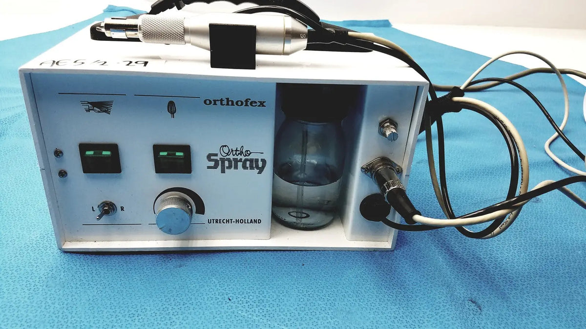 White orthofex ortho spray professional heavy duty podiatry drill with silver black handpiece glass reservoir and control knobs