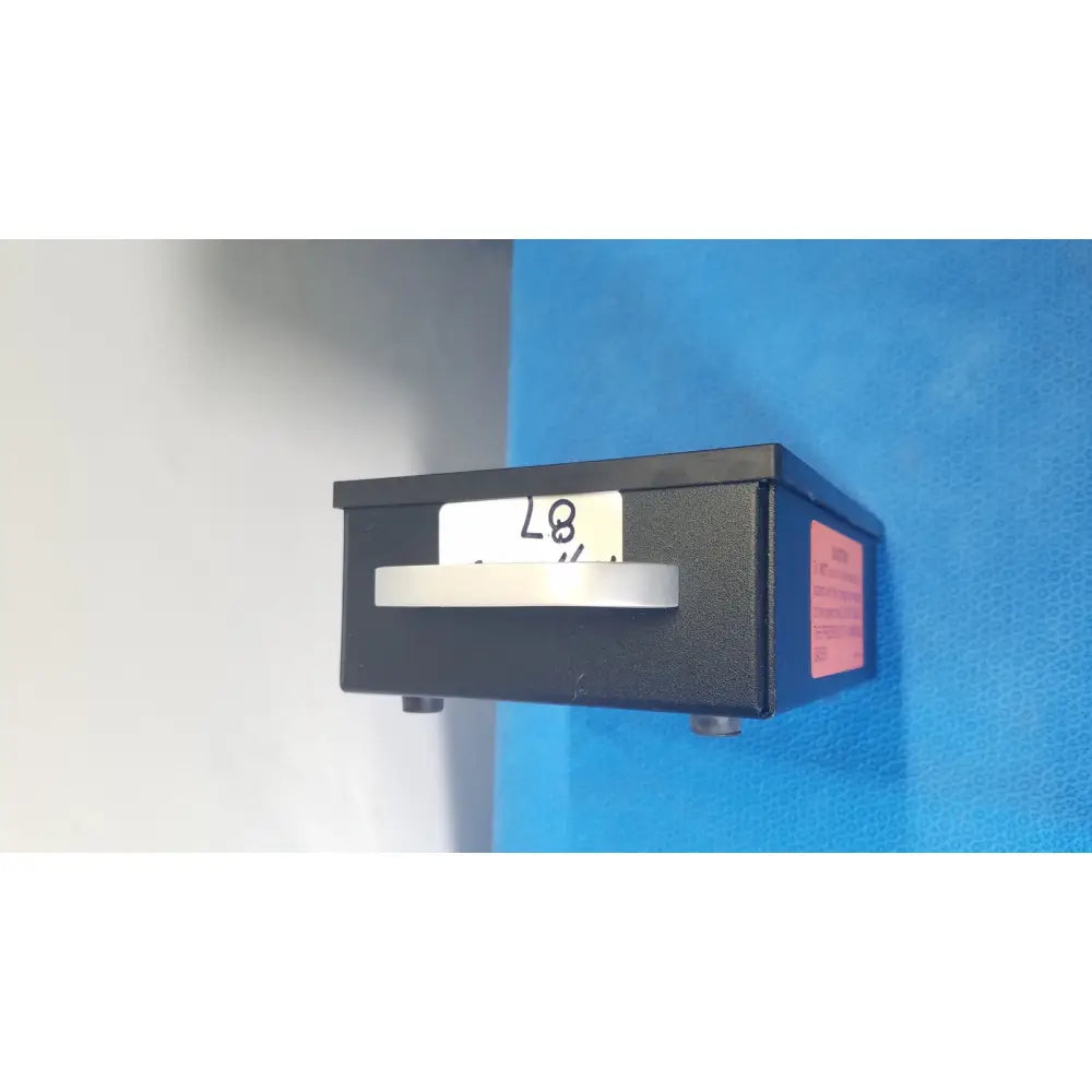 Black rectangular parks medical electronics flow detector model 811-b with silver handle and pink side label