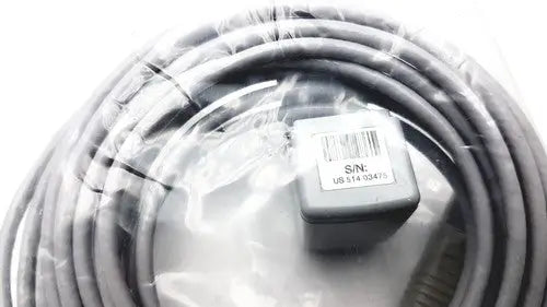 Gray coiled cable with a small gray rectangular connector labeled s/n ub s14 30475 for philips advanced etco2 sensor