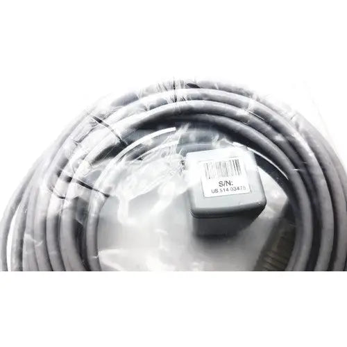 Gray coiled cable with a small gray rectangular connector labeled s/n ub s14 30475 for philips advanced etco2 sensor