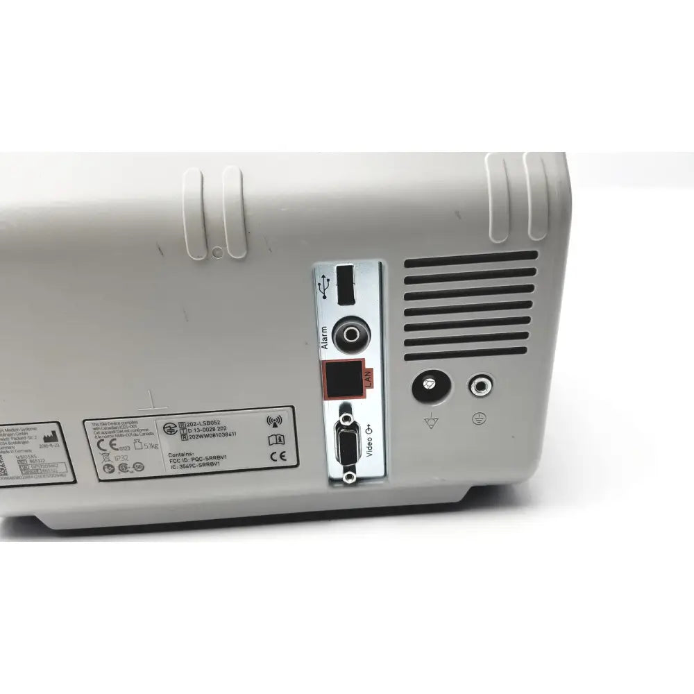 Back side of gray plastic philips intellivue mp5sc touch screen patient monitor with usb port audio jacks and ventilation slits