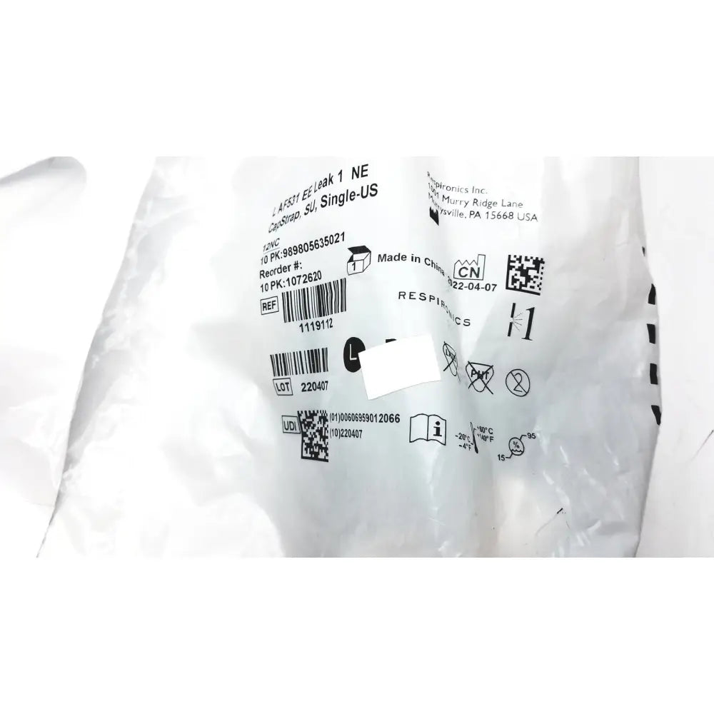 White plastic packaging with printed labels and barcodes for philips l af531 ee leak single-use capstrap reuse medical product
