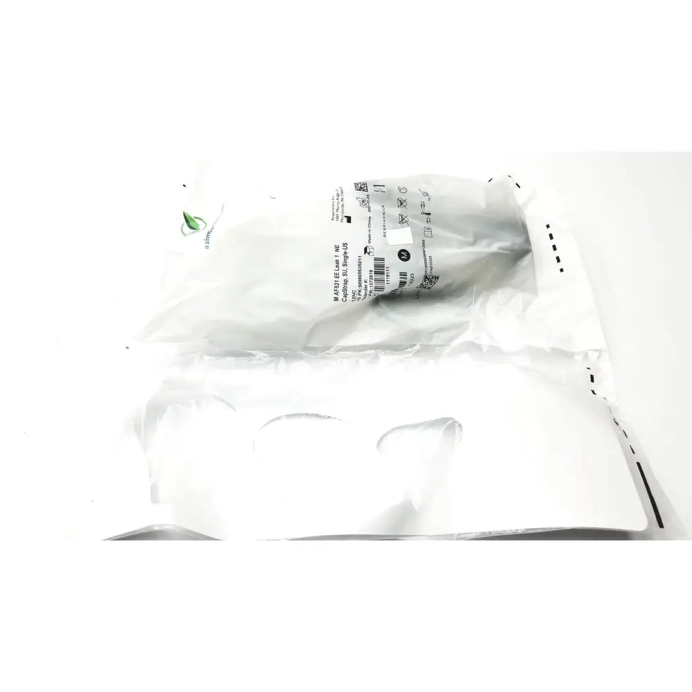 A white sterile medical mask philips m af531 packaged in clear plastic bag with care instructions and af531 ee leak branding