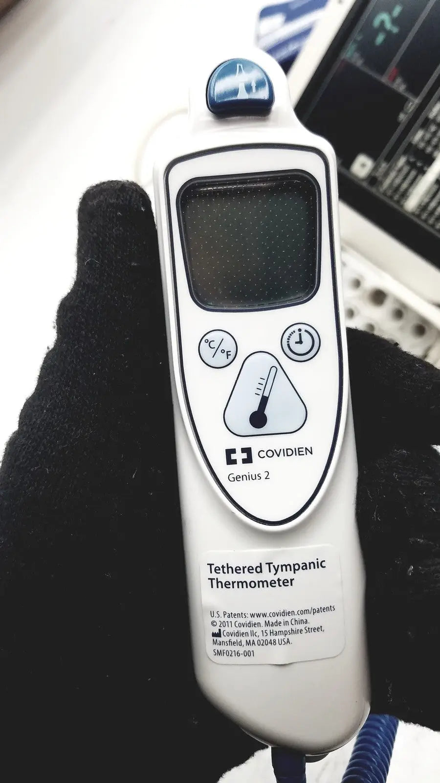 White plastic coviden genius 2 tethered tympanic thermometer with blue sensor tip for philips suresigns vs4 vital signs monitor