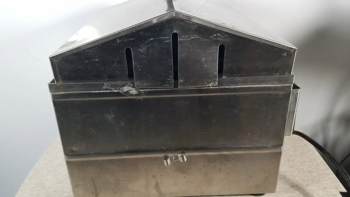 Stainless steel precision scientific metabolic shaking incubator 66722 with gabled top, three vertical slots, and front latch