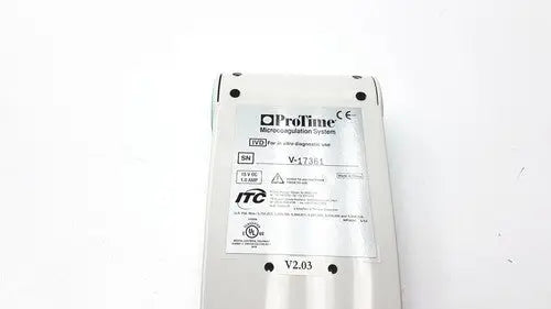 Silver metallic protime ivd microcoagulation system showing protime ivd diagnostic tool with model and certification label