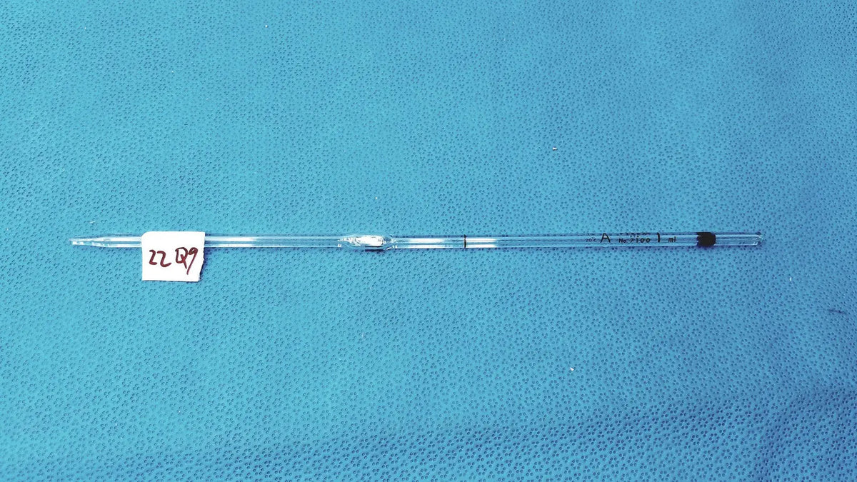 Pyrex class a 1ml glass volumetric pipette made of clear glass with black markings and white label 2287