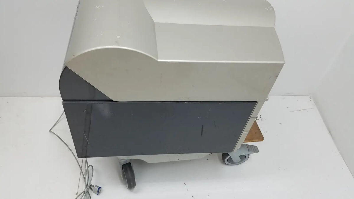 Silver and black industrial-grade pyrosequencing psq96 analysis pyrosequencer with curved top panel and caster wheels for mobility