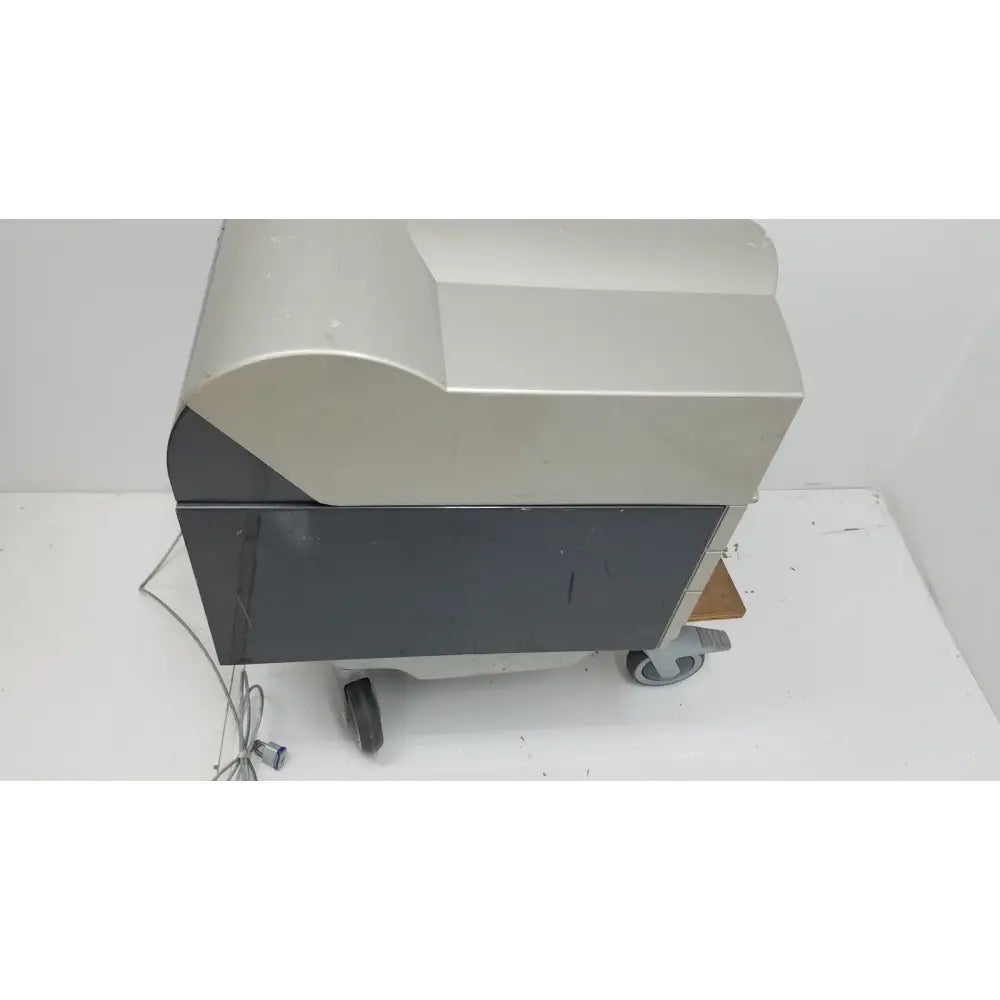 Silver and black industrial-grade pyrosequencing psq96 analysis pyrosequencer with curved top panel and caster wheels for mobility