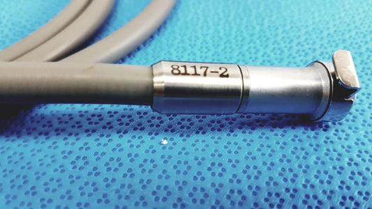 Gray and silver r wolf 8064.40 fiberoptic light cable with metallic tip and 8117-2 marking for surgical illumination