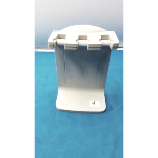 White plastic Rainin E3 Rapid rapid charger stand with three vertical slots for holding books or devices