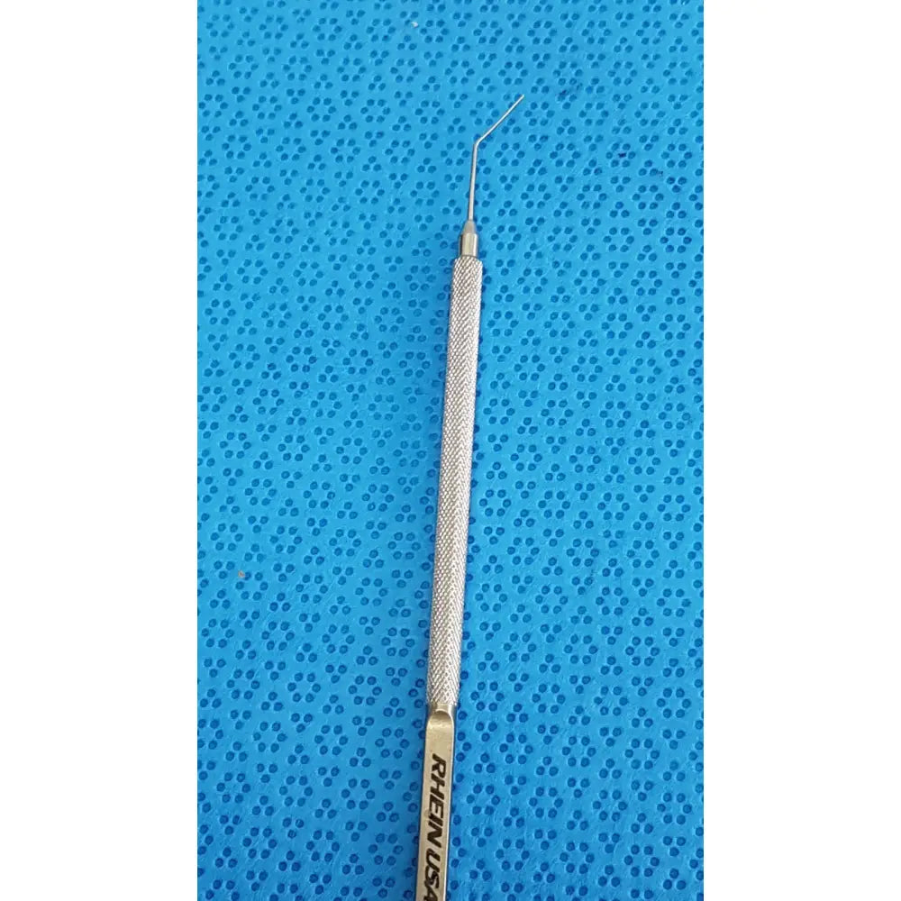 Silver lindstrom star manipulator with textured grip and curved tip branded rhenen usa titanium surgical tool