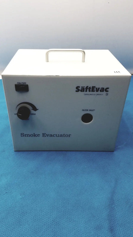 White rectangular SafEvac smoke evacuator EV - 09EV063 with black power switch, rotary dial, and filter inlet on the back side