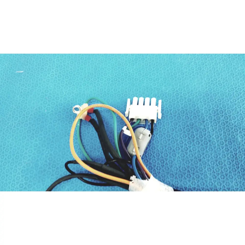 A white plastic multi-pin connector with yellow green blue and black wires for seiwa ferrite connectors lead wire harness cable