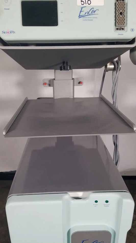 Light gray senorx cm3000 control module with digital display labeled encor for encor breast biopsy vacuum system