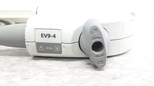 White and gray siemens ev9-4 endocavity ultrasound transducer probe showing circular port cover with directional arrows