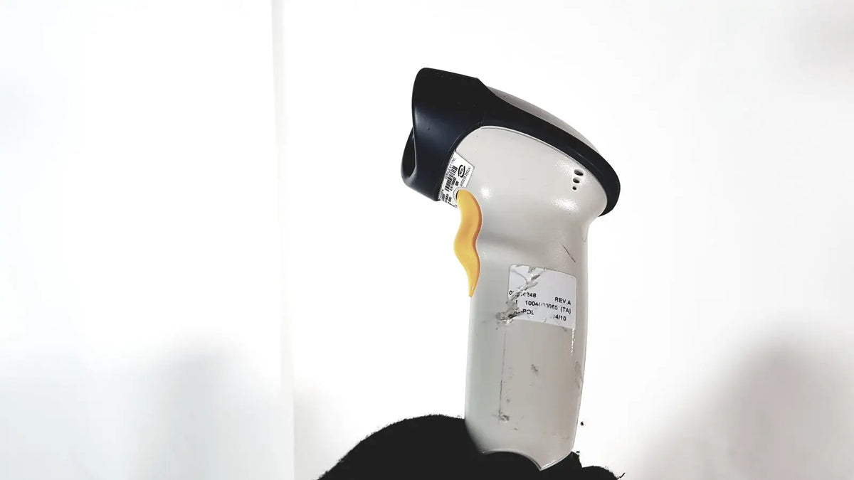 Siemens rapidpoint handheld barcode scanner with white and black body and yellow trigger for reuse medical systems