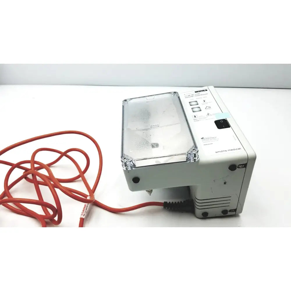White plastic smiths medical blood and fluid warmer level 1 HL-90 with transparent lid and orange power cord 115V