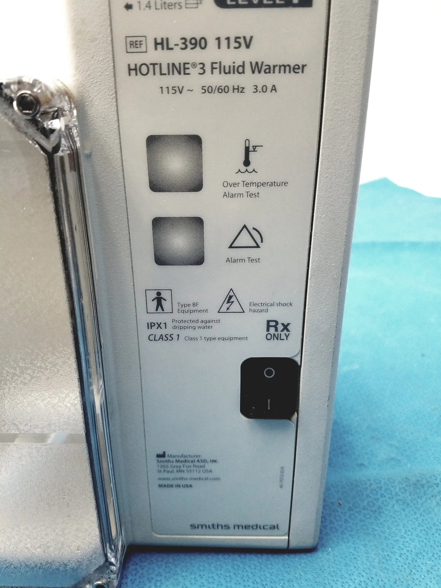 Silver metal medical fluid warmer labeled hotline 3 by smiths medical for efficient patient fluid warming