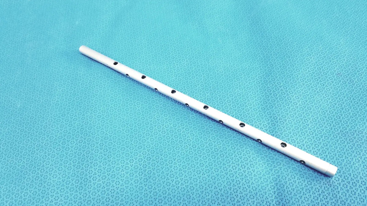 White plastic pretzel articulating retractor with evenly spaced black circular holes by Snowden Pencer 89-6132